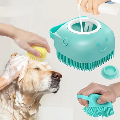 Teal silicone pet bath brush with soap dispenser being used on golden retriever